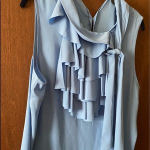 Light blue sleeveless top with tieneck